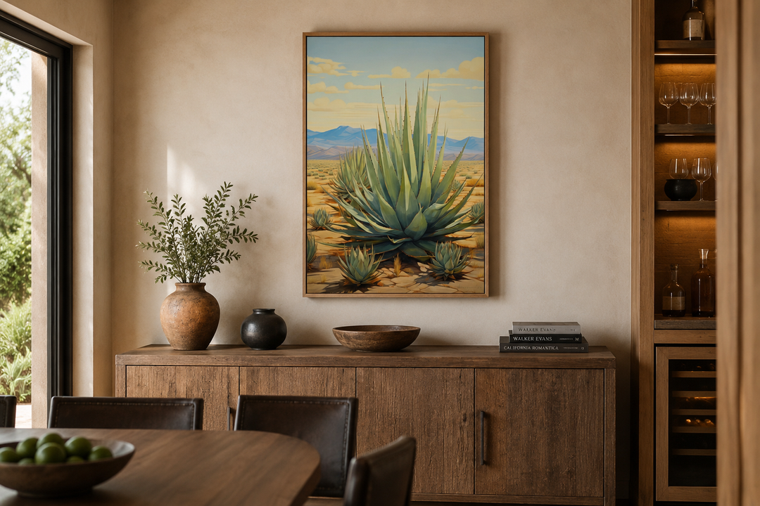 Agave in the desert framed canvas wall art displayed above a wooden sideboard in a dining room.