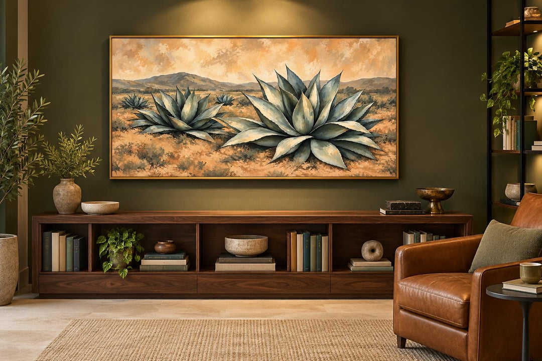 Southwestern agave plants in a golden desert landscape framed canvas wall art above a wood console.