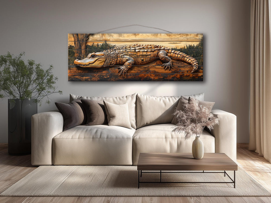 Alligator rustic distressed wood wall art hanging above a modern sofa in a neutral living room.