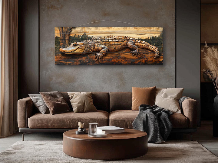 Alligator rustic distressed wood wall art hanging above a brown sofa in a modern living room.