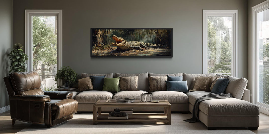 A long horizontal canvas print of an alligator in a swamp hangs above a sofa in a modern living room.