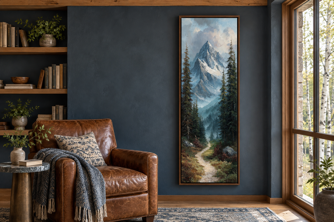 Vertical narrow canvas art of a mountain path and snowy peaks in a rustic living room setting.
