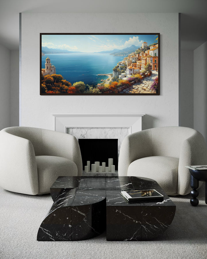 Amalfi Coast framed canvas wall art above a white fireplace in a modern living room.