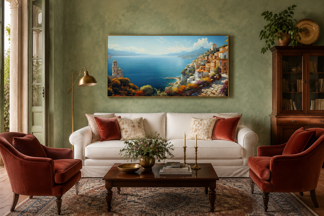 Large framed Amalfi Coast canvas wall art depicting a colorful Italian seaside town over a sofa.