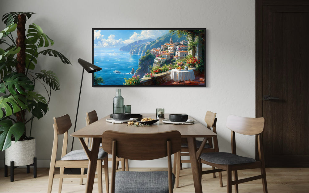 Amalfi Coast Window View Framed Canvas Wall Art in a dining room with a table