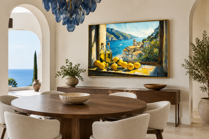 Amalfi Coast window view wall art with lemons and olive oil above a dining room sideboard.