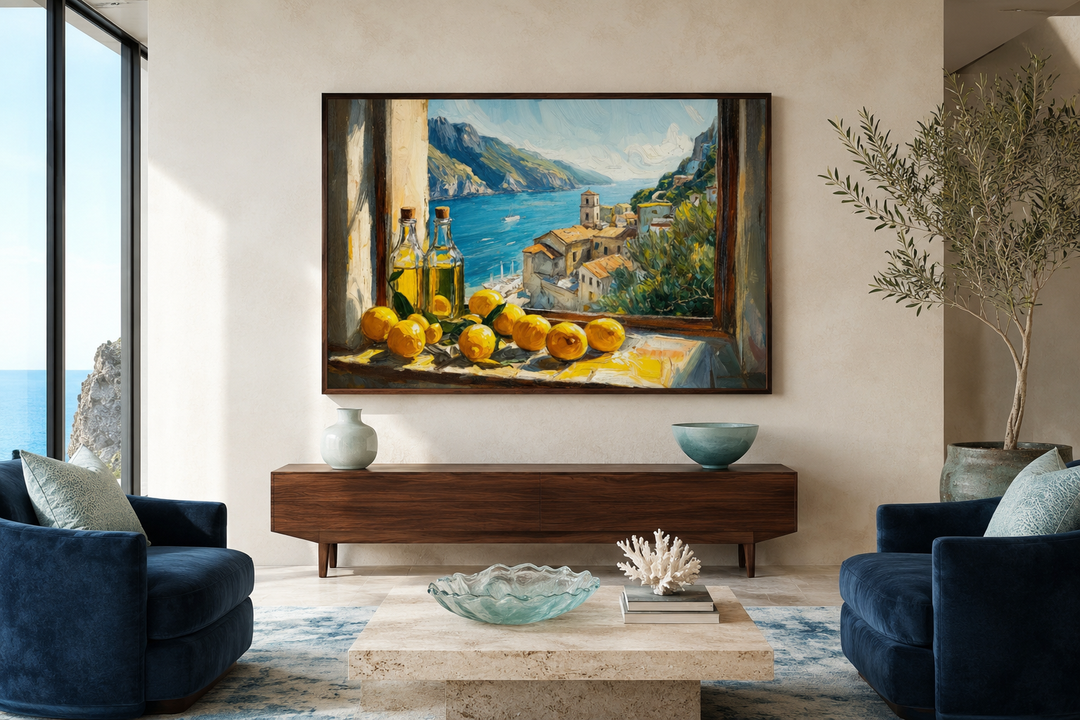 Amalfi Coast window view wall art with lemons and olive oil above a wooden sideboard in a room.