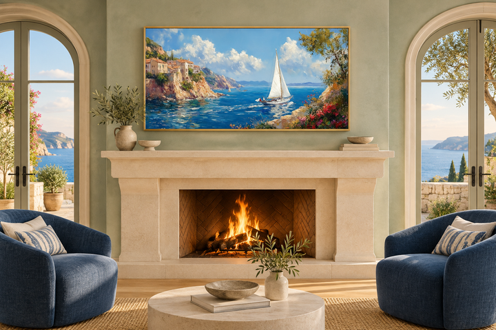 Amalfi Coast With Sail Boat Framed Canvas Wall Art displayed above a fireplace in a coastal room.