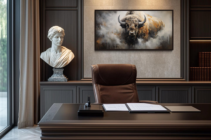 American bison abstract dripping paint framed canvas wall art in a dark wood office setting.