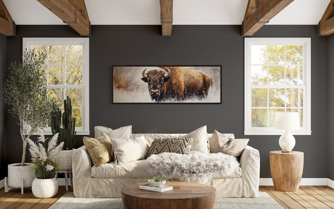 American Buffalo long horizontal framed canvas wall art hanging above a sofa in a rustic living room