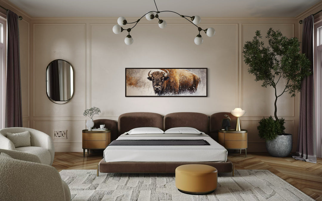 American Buffalo long horizontal framed canvas wall art hanging above a bed in a modern bedroom.