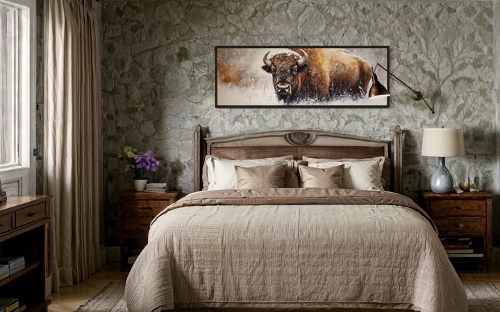 American Buffalo long horizontal framed canvas wall art hanging above a bed in a rustic bedroom.