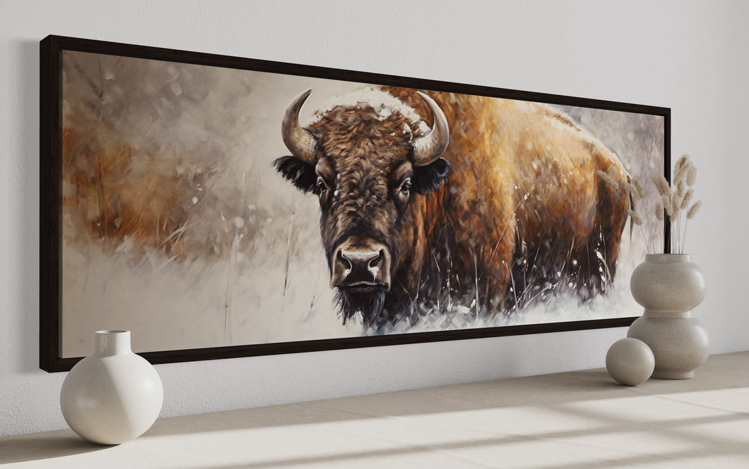 American buffalo long horizontal framed canvas wall art featuring a bison in a snowy landscape.