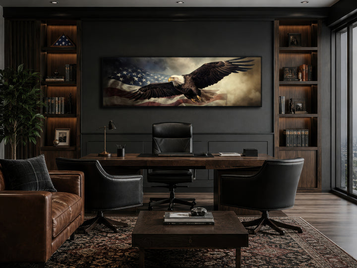 Horizontal wall art of a bald eagle flying over the American flag in a dark, modern office.