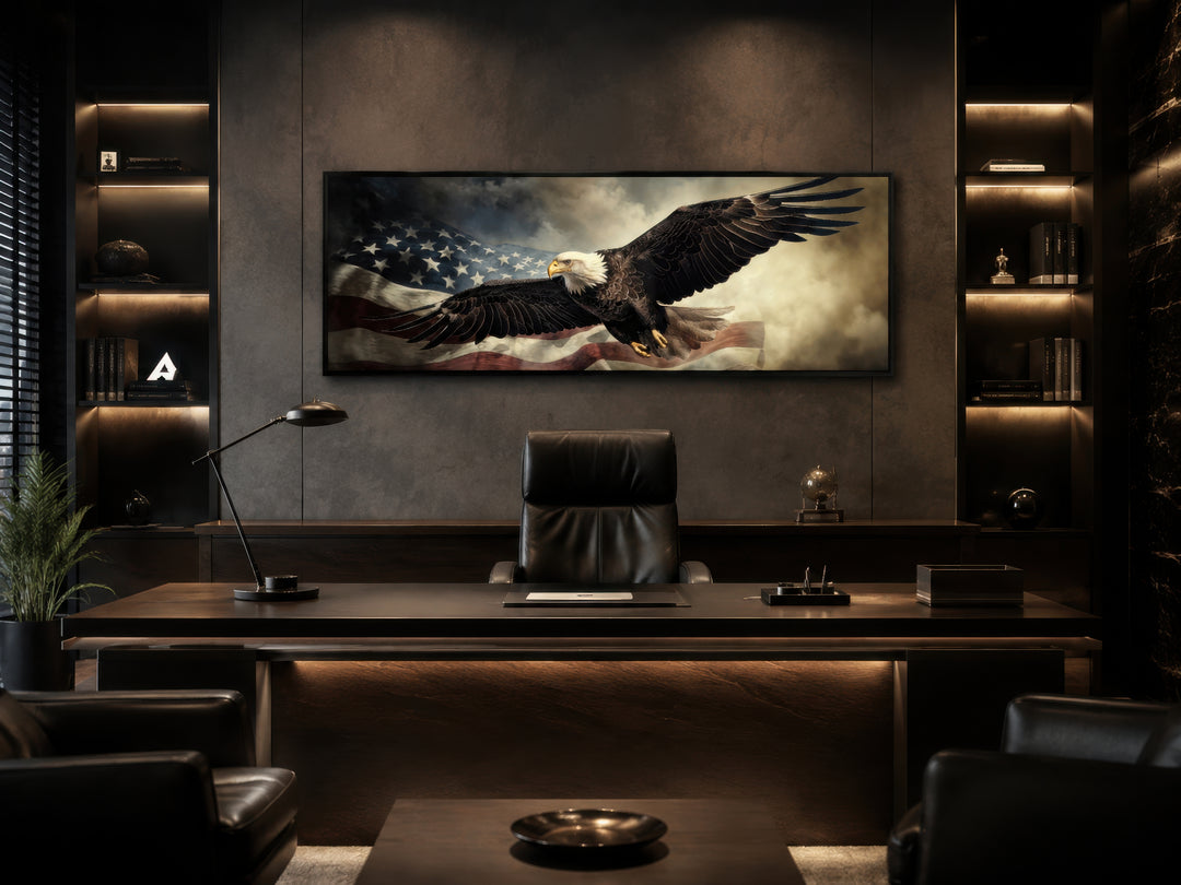 Horizontal wall art of a bald eagle flying over the American flag in a dark, modern office.