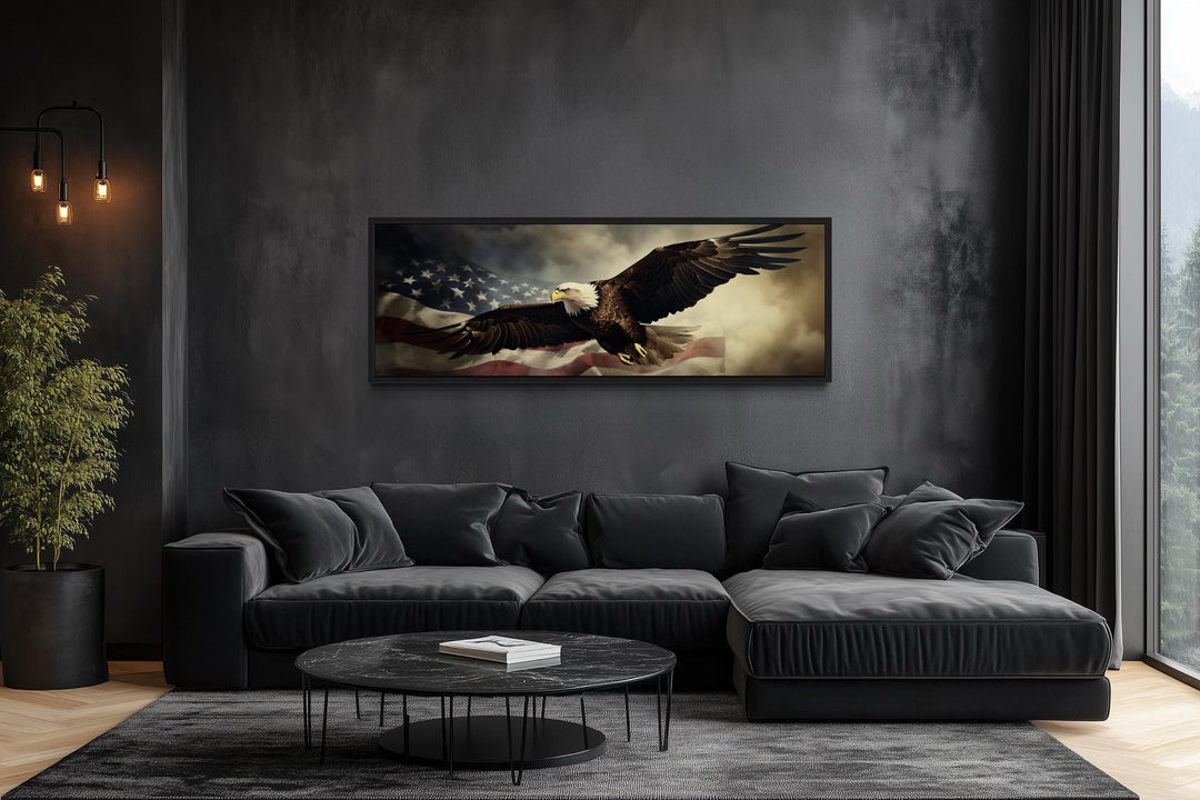 Horizontal wall art of a bald eagle flying over the American flag in a modern dark living room.