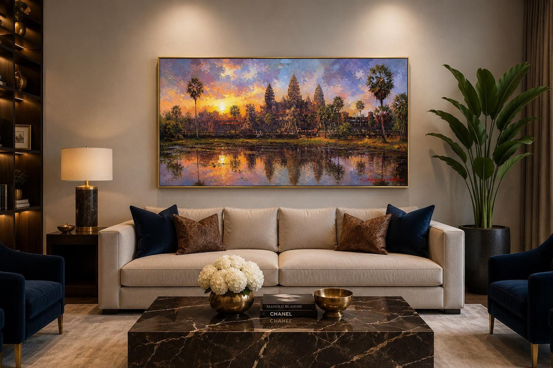Angkor Wat sunset canvas wall art above a sofa in a modern living room.
