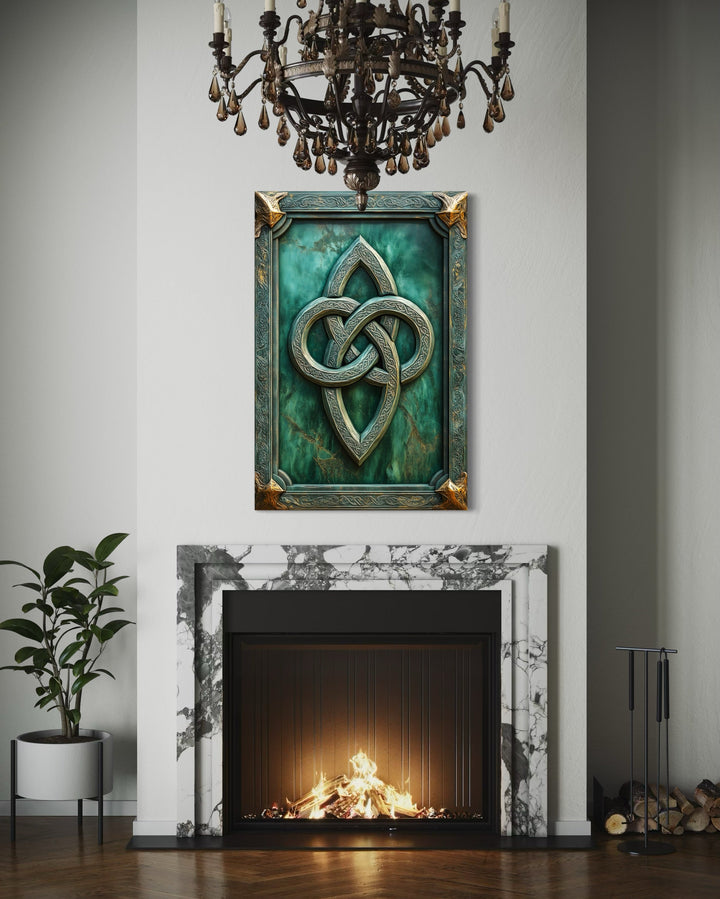 Antique Celtic Knot framed canvas wall art hanging above a marble fireplace in a modern room.