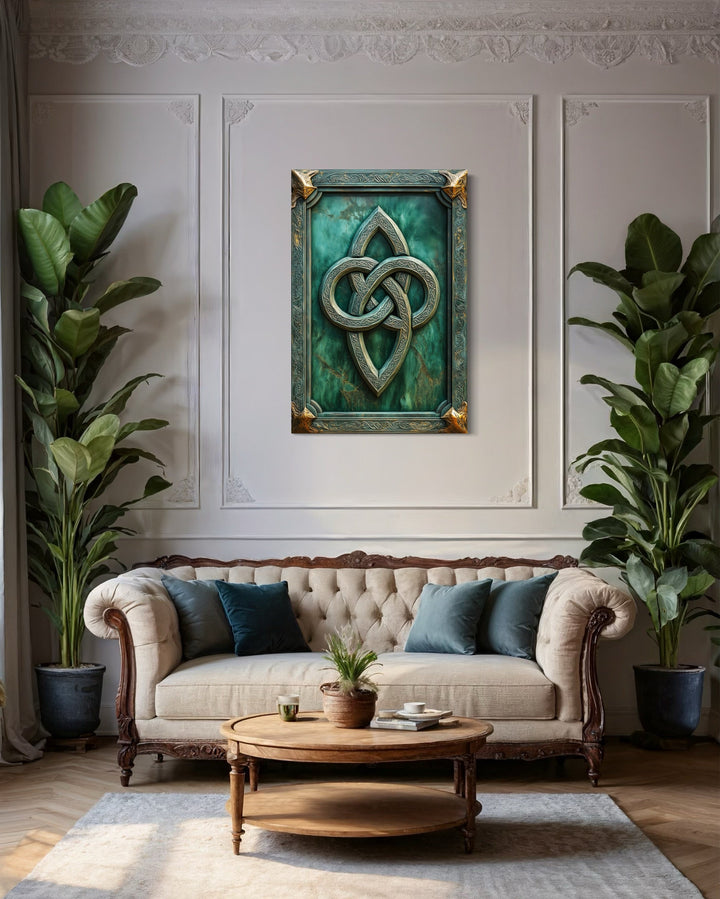 Antique Celtic Knot Framed Canvas Wall Art in a living room with a couch, coffee table and potted plants