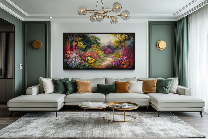 Antique flower garden framed canvas wall art above a modern sofa in a living room.