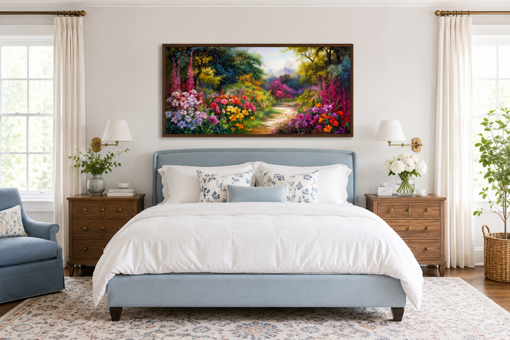 Antique flower garden framed canvas wall art above a blue bed in a bright bedroom.