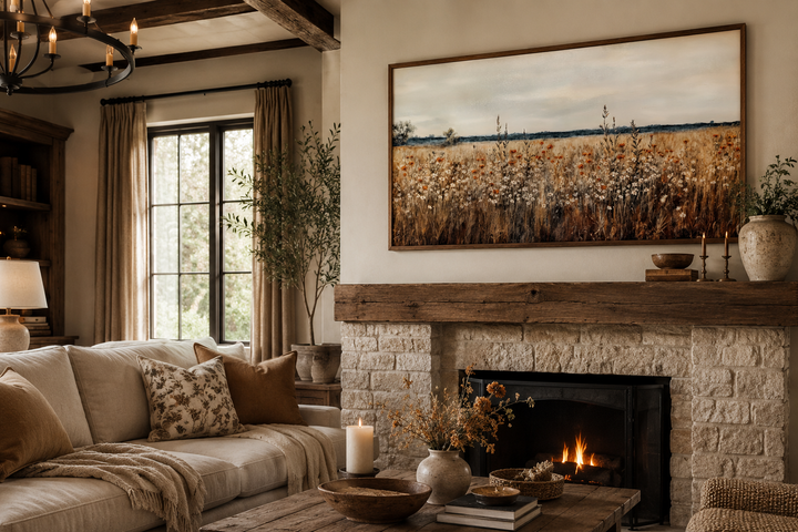 Antique rustic wildflowers field framed canvas wall art hanging above a stone fireplace.