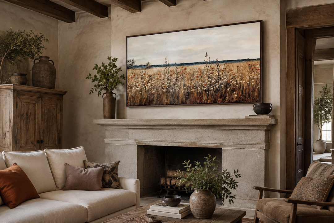 Antique rustic wildflowers field framed canvas wall art hanging above a stone fireplace.