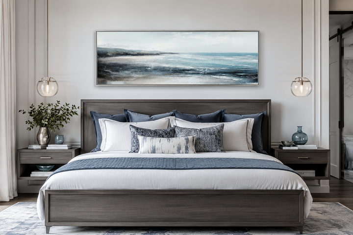 Aqua blue ocean beach coastal framed canvas wall art displayed over a modern dark wood bed.