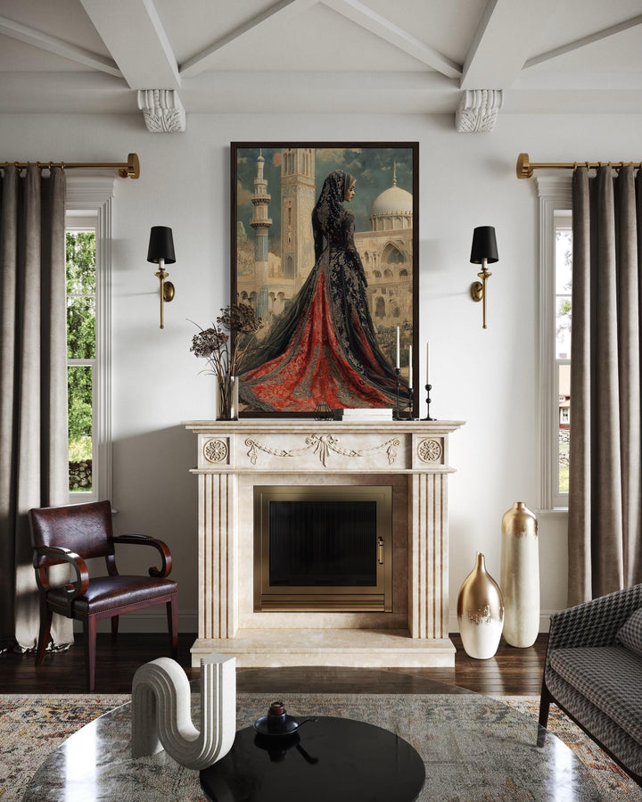 Framed canvas art of an Arabic princess in a red and black gown before a grand mosque over a mantel.