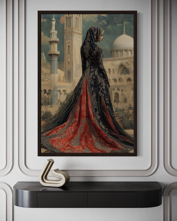 Framed canvas wall art of an Arabic princess in a red and black dress before a grand mosque.