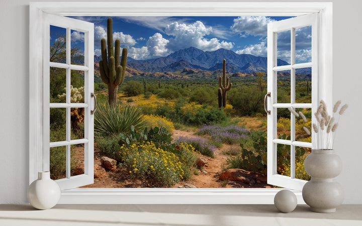 Arizona desert landscape with saguaro cacti seen through a white fake window frame wall art.