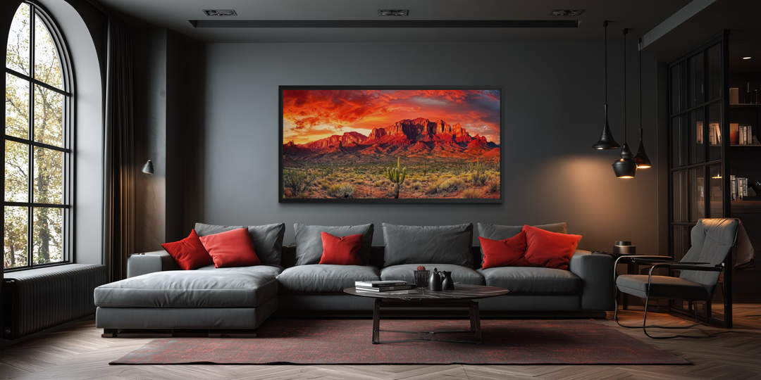 Arizona desert landscape at sunset framed canvas wall art hanging in a modern dark living room.