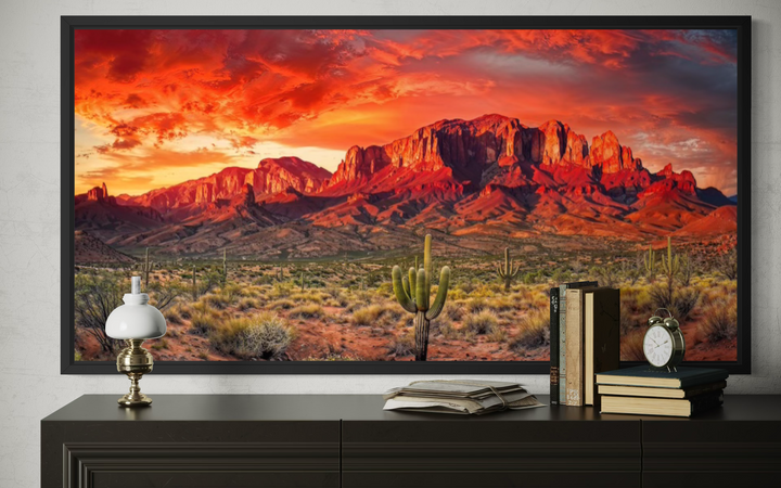 Arizona desert landscape at sunset framed canvas wall art above a dark wood dresser.