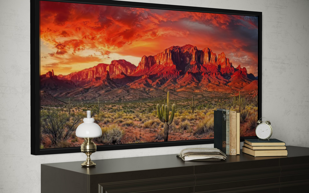 Arizona desert landscape at sunset framed canvas wall art above a dark wood dresser.
