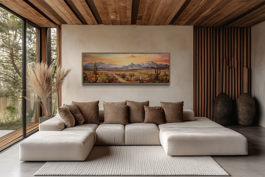 Arizona desert landscape at sunset long horizontal framed canvas wall art above a modern sofa.