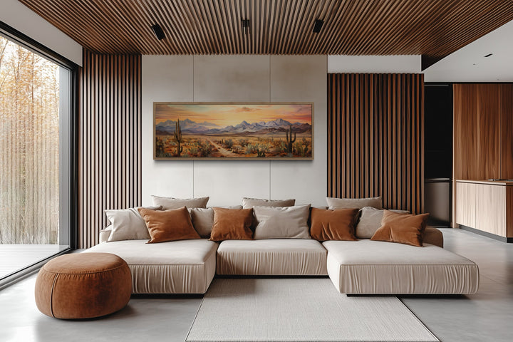 Arizona desert landscape at sunset long horizontal framed canvas wall art above a modern sofa.