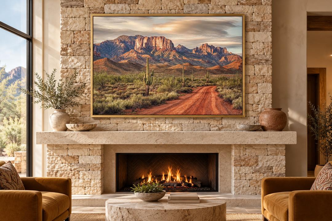 Arizona Desert landscape canvas art with Four Peaks and saguaro cacti in a gold frame over fireplace.