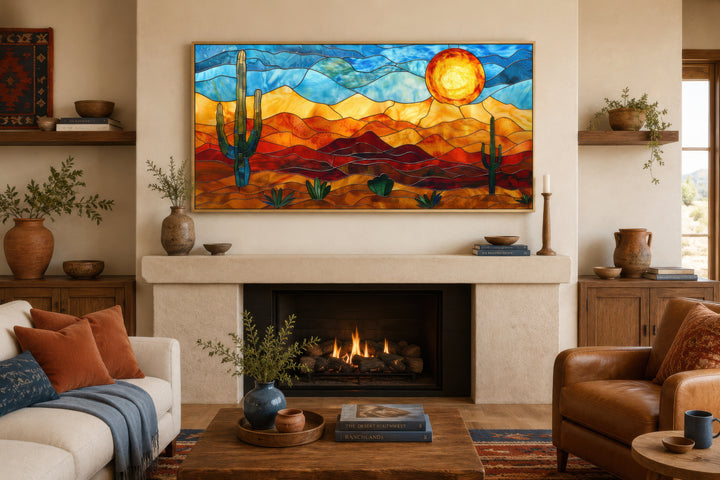 Southwestern desert wall art in a stained glass style framed canvas above a fireplace mantel.