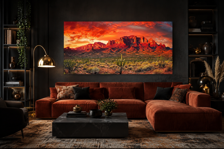 Arizona desert landscape at sunset framed canvas wall art above a rust-colored velvet sofa.