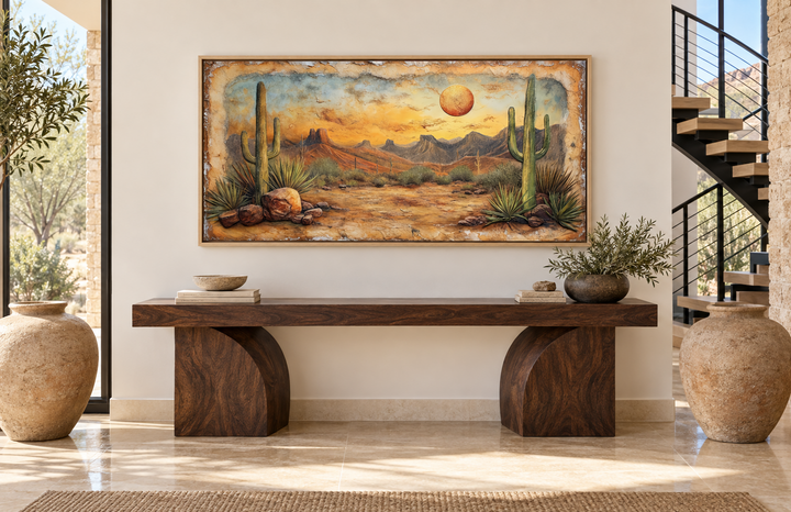 Arizona desert landscape canvas wall art with cacti and sunset over a rustic wooden console table.