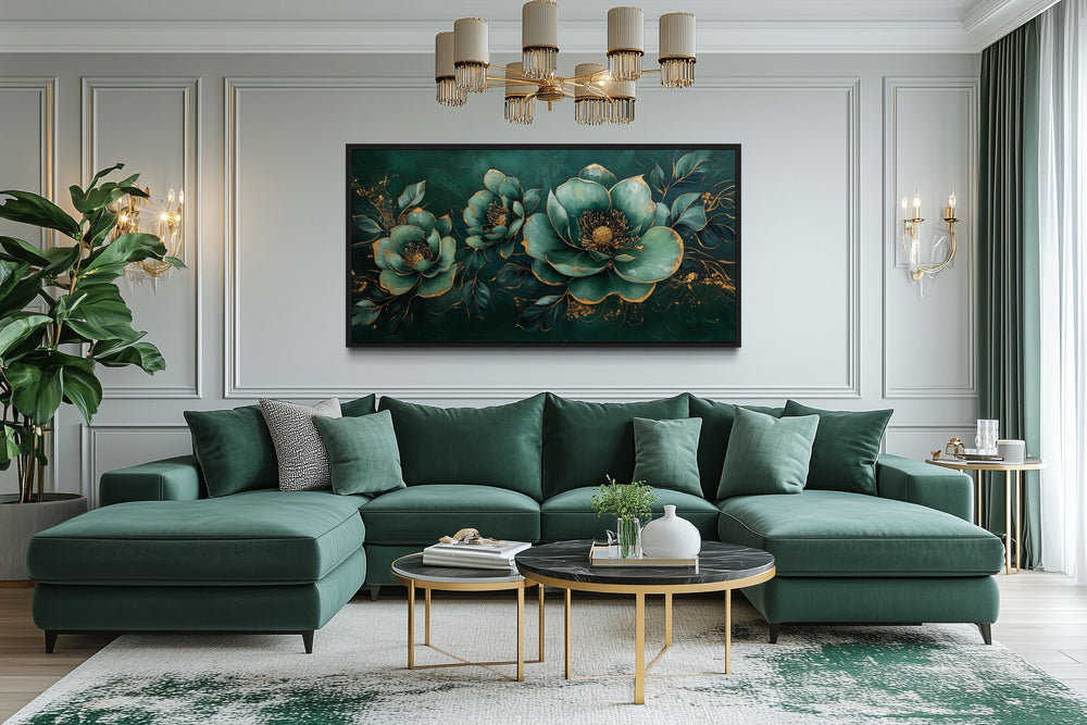 Art Nouveau emerald green and gold floral canvas print centered above a green sectional sofa.
