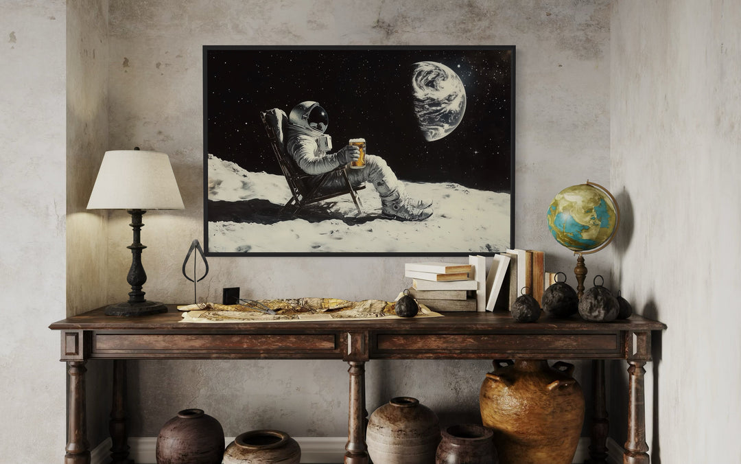 Astronaut On The Moon Drinking Beer Framed Canvas Wall Art