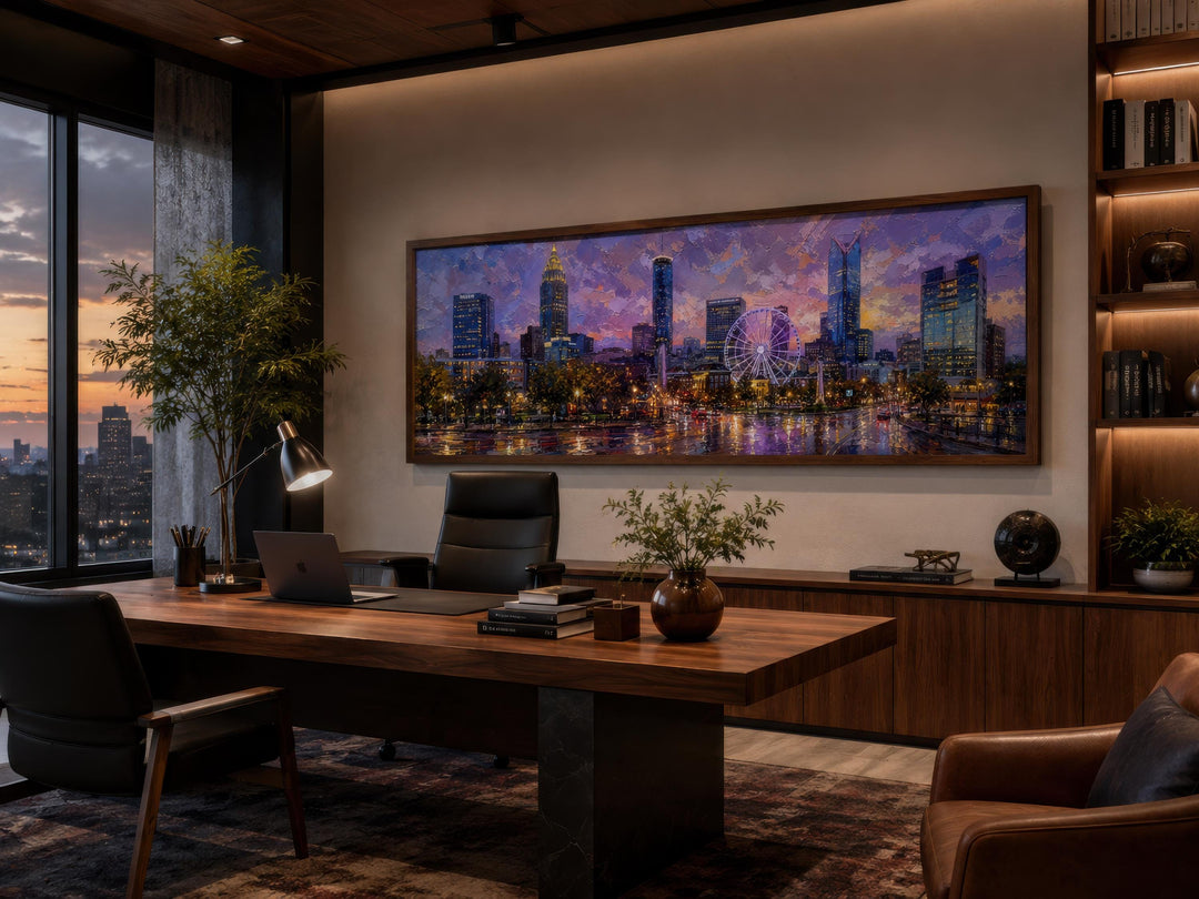 Panoramic Atlanta skyline canvas art above a desk in a modern office with sunset cityscape view.