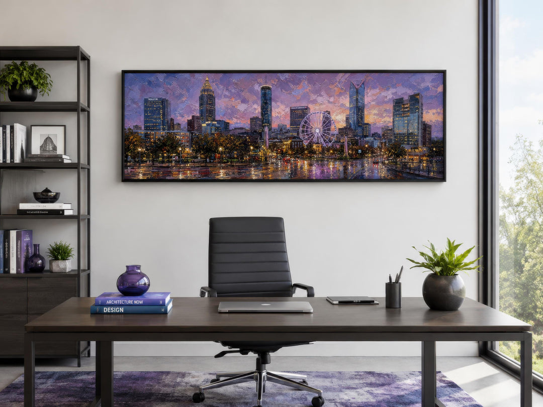 Panoramic Atlanta skyline canvas print at sunset above a modern office desk with a black chair.