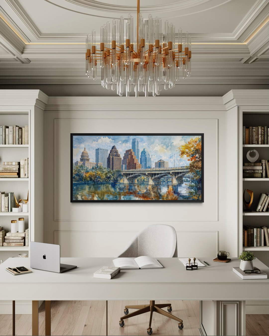 Framed watercolor canvas of the Austin skyline and bridge hanging in a modern home office.