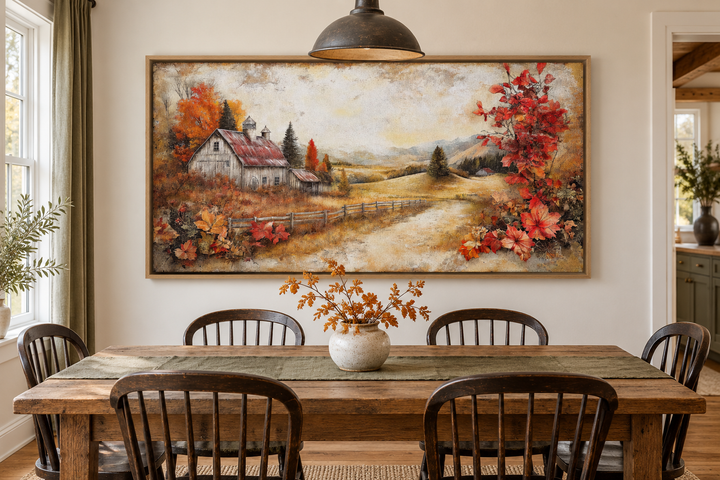 Autumn farm barn rustic canvas wall art in a wooden frame above a farmhouse dining table.