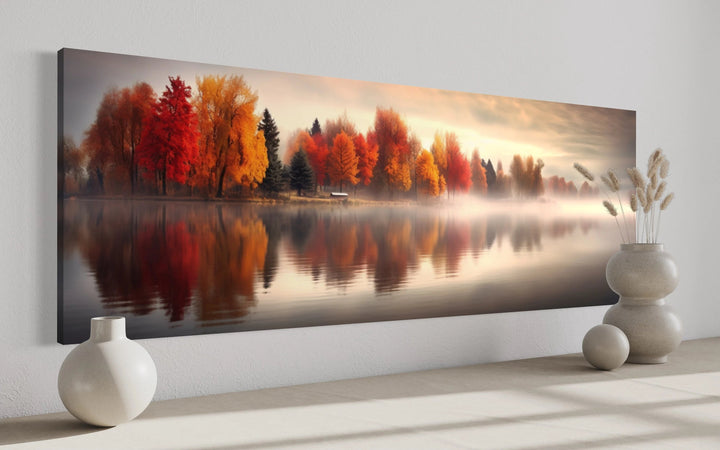 Autumn forest lake reflection long horizontal canvas wall art in a modern room setting.