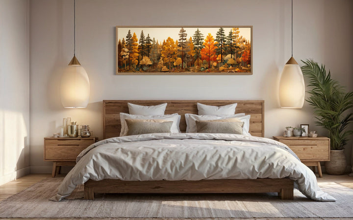 Autumn forest painting on wood, long horizontal wall art displayed above a bed in a rustic room.