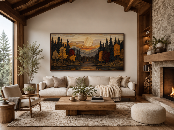 Autumn forest sunset rustic canvas wall art above a sofa in a cozy cabin living room.