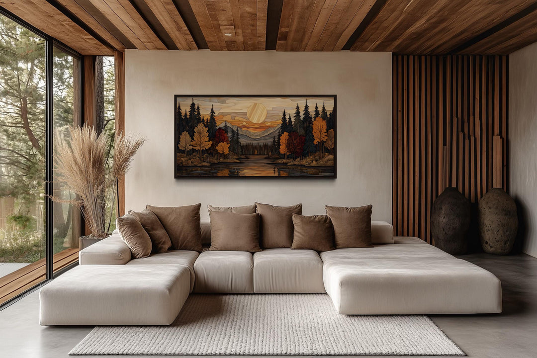 Autumn forest sunset rustic canvas wall art hanging above a modern sofa in a cabin-style room.